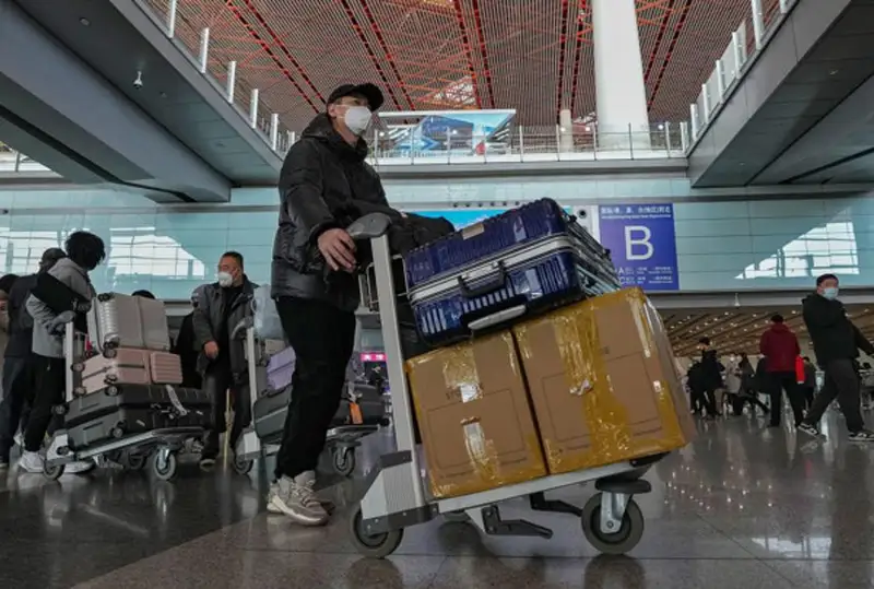 COVID-19 чекловлари олиб ташланганидан кейин Хитойга кирувчилар сони 50 фоизга ошди