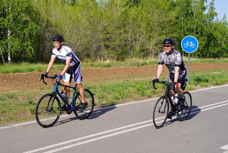 Председатель правления КТЖ и региональный директор PSA International провели совместный велопробег