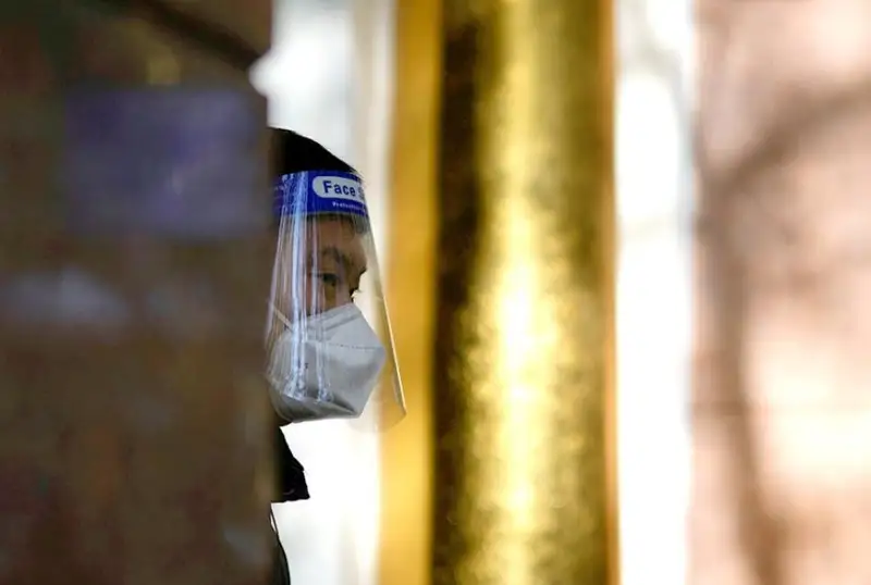 В Китае скорректировали медстраховку пациентов с COVID-19