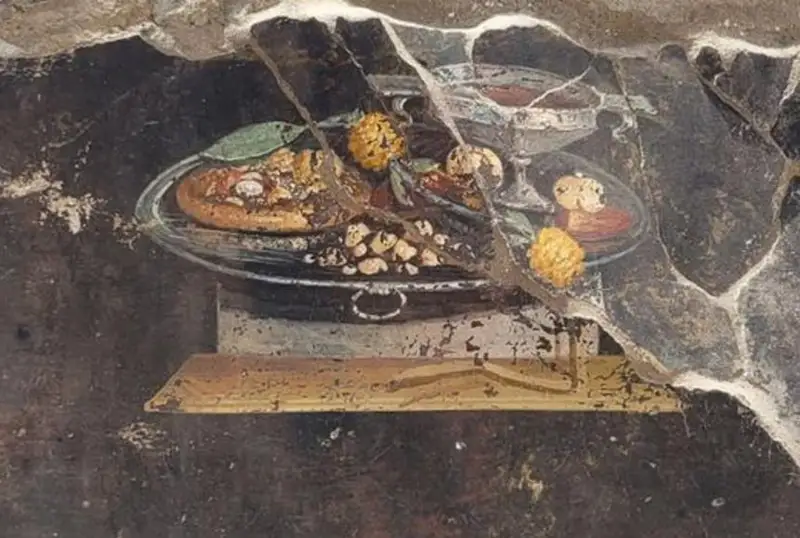 Картину с изображением похожей на пиццу лепешки нашли в Помпеях
