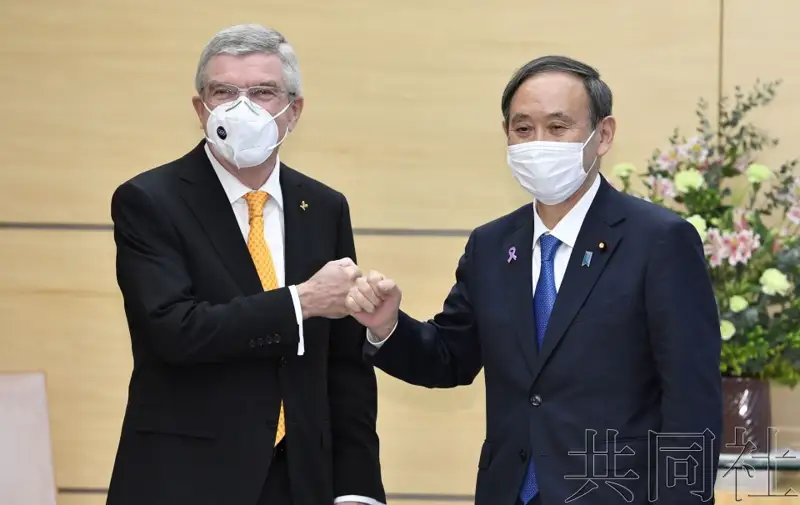 菅义伟会晤IOC主席 决心明年举办奥运