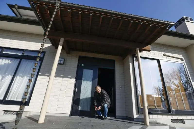 Фукусимадаги портлашдан жабр кўрган Футаба аҳолисига ўз уйларида тунашга рухсат берилди