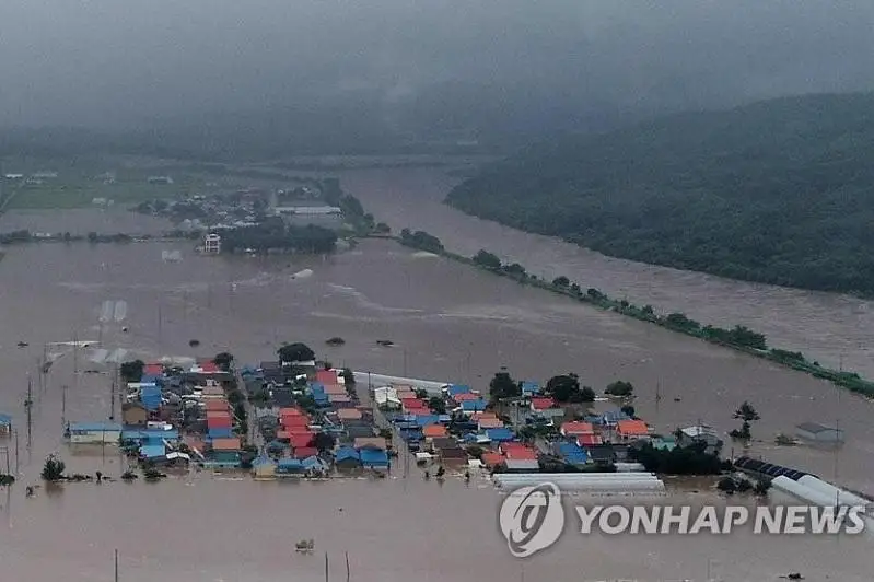 韩政府将7个市郡划为暴雨特别灾区