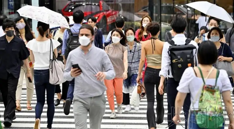 日本首相称将讨论下调新冠肺炎的传染病级别