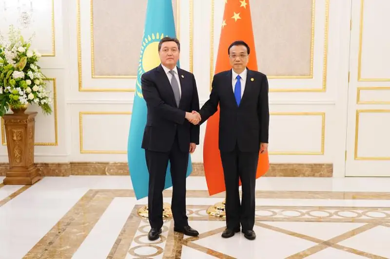 阿斯哈尔•马明会见中国国务院总理李克强