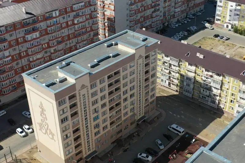 Атирау шаҳридаги 33 оилага янги квартираларнинг калитлари топширилди