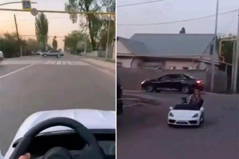 Мужчина с ребенком на игрушечной машине прокатился по дорогам Алматы