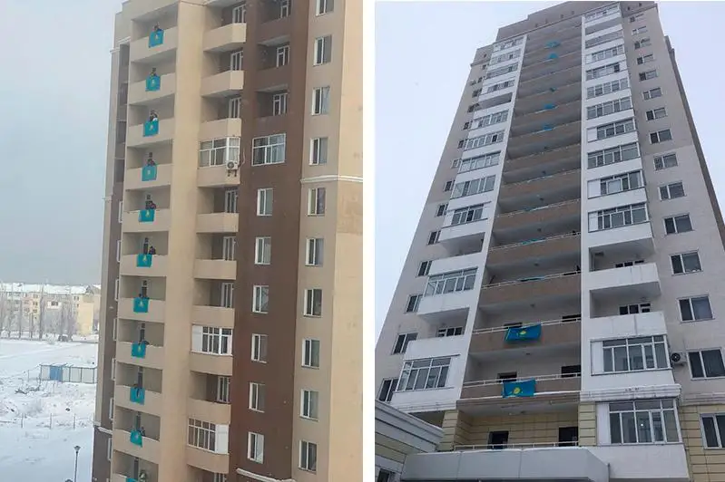В Талдыкоргане жители в честь праздника вывесили государственные флаги на балконах