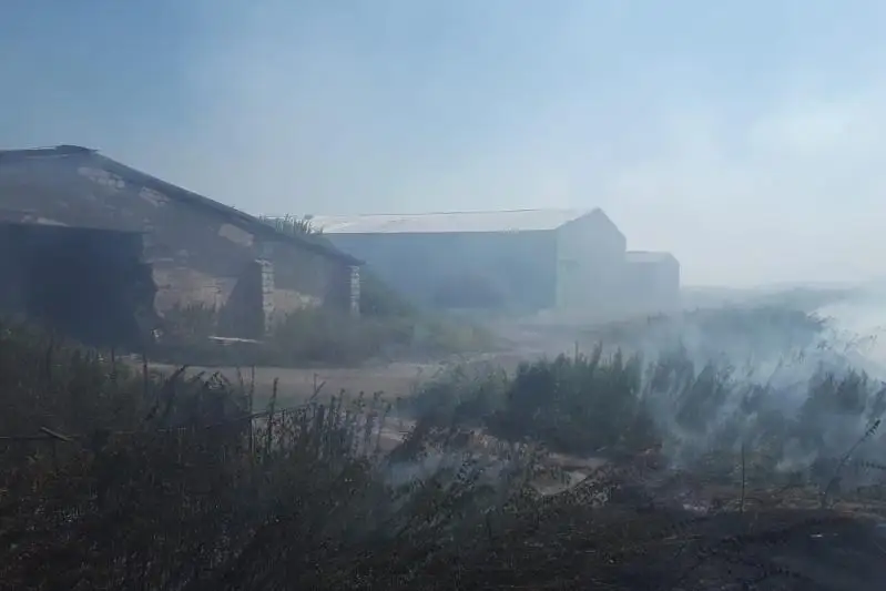 Три склада с зерном спасли от огня в СКО