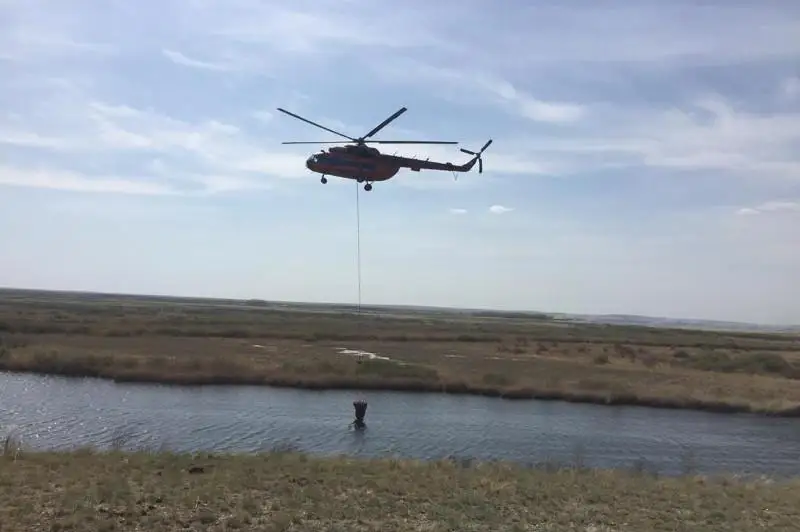 Тонны воды с земли и воздуха: бушевавший неделю лесной пожар потушили в ВКО