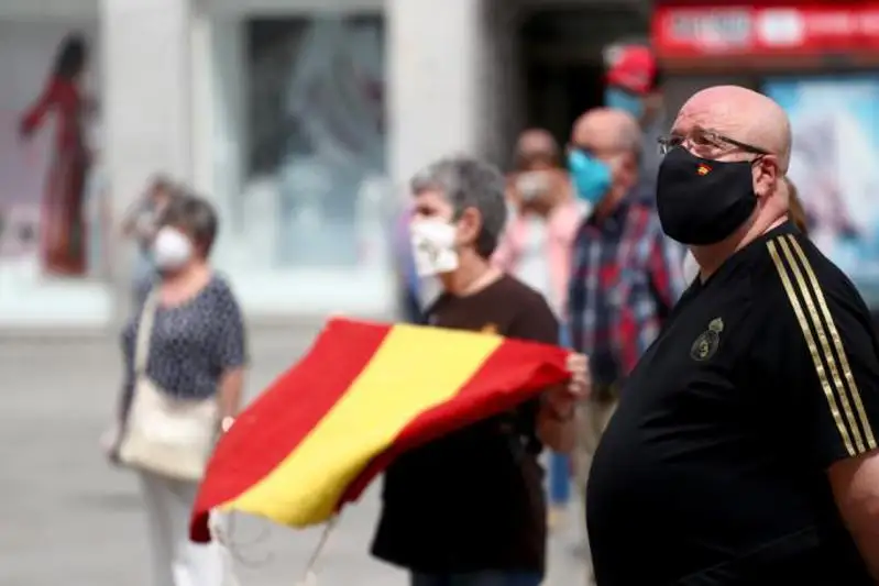 Память 28 тысяч жертв эпидемии почтили в Испании