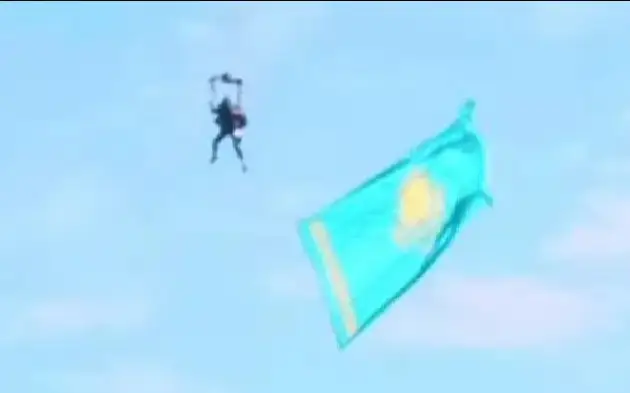 Kazakh girl plays kobyz while skydiving