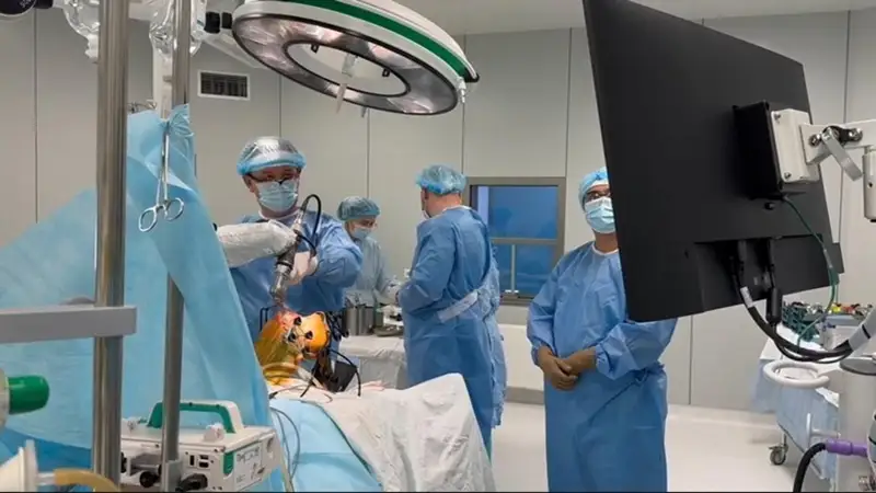 роботтың көмегімен