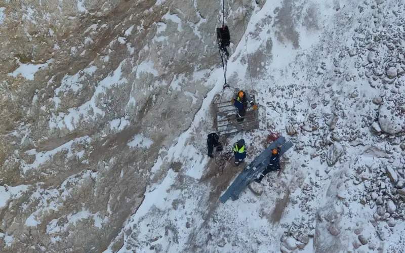 Bus with rescuers buried in collapsed gold mine not found  