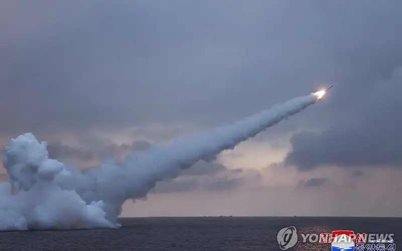 N.K. leader oversees submarine-launched cruise missile test 