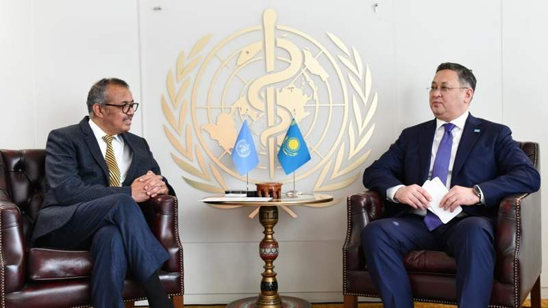 Kazakh Foreign Minister Murat Nurtleu, WHO Director-General Tedros Ghebreyesus