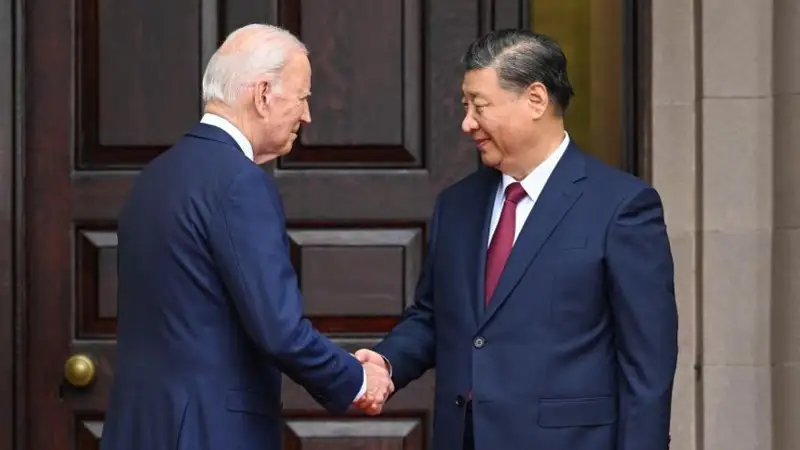 Joe Biden and Xi Jinping shake hands during their meeting in California. Photo credit: Xinhua/Rao Aimin 