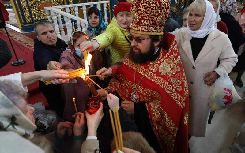 Как в Астане встречали Благодатный огонь из Иерусалима - фоторепортаж