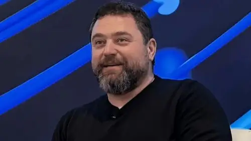 миллиардер