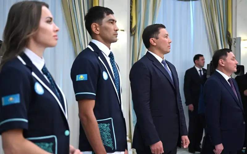 President Tokayev hands in state flag to 2024 Olympic Games participants President Tokayev hands in state flag to 2024 Olympic Games participants