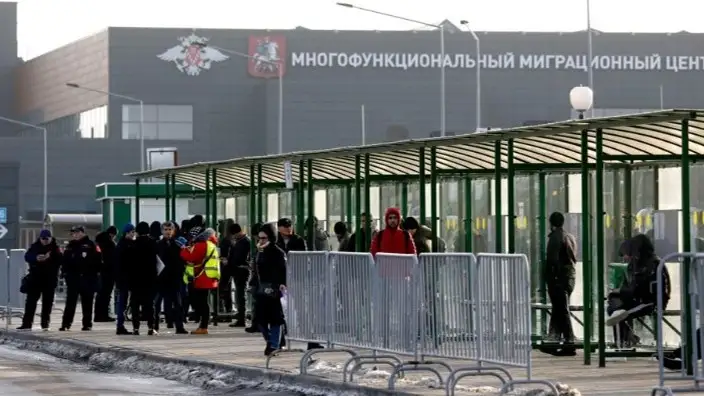 мигранты в России