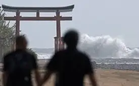 Transport disrupted as typhoon expected to hit western Japan
