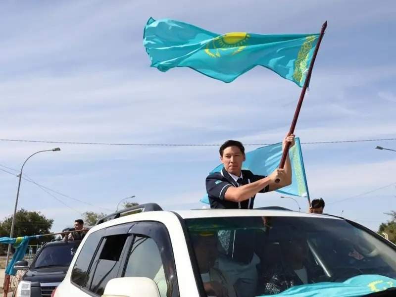 Cars and apartments gifted to Kazakh swimmer Nurdaulet Zhumagali and his coach