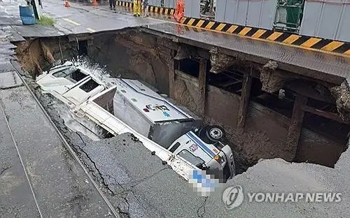 Over 900 evacuated as heavy rain floods homes, roads in southern South Korea