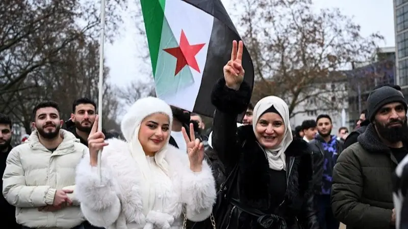 Сирийцы в Берлине празднуют падение режима Асада