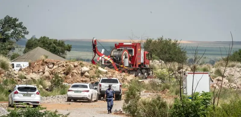 Police officers and forensic pathology service members work during a rescue operation at an abandoned gold mine in Stilfontein, North West Province, South Africa, on Jan. 13, 2025. 