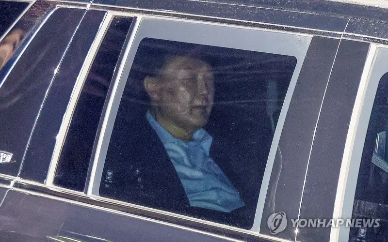 Impeached President Yoon Suk Yeol is taken to the Seoul Detention Center after being questioned over his short-lived imposition of martial law at the Corruption Investigation Office for High-ranking Officials in Gwacheon, just south of Seoul, on Jan. 15, 2025. 