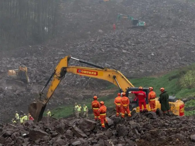 Rescuers search for missing people at the site of a landslide in Junlian County in the city of Yibin, southwest China's Sichuan Province, Feb. 9, 2025. 