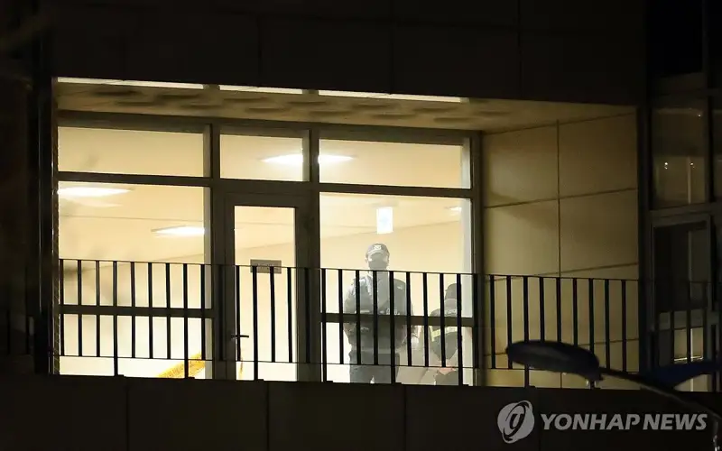 Police conduct an on-site inspection on the second floor of an elementary school in the central city of Daejeon, 