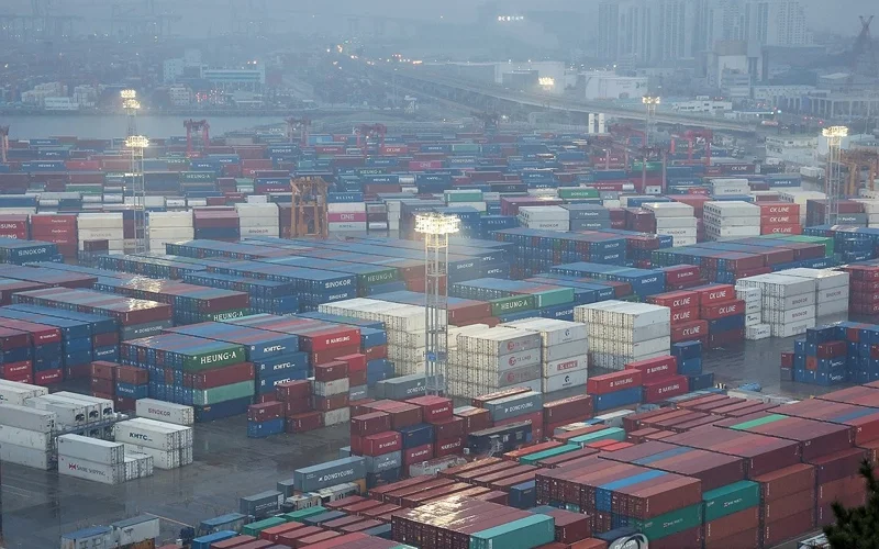 This file photo, taken Feb. 1, 2025, shows stacks of shipping containers at a port in Busan, about 320 kilometers southeast of Seoul.