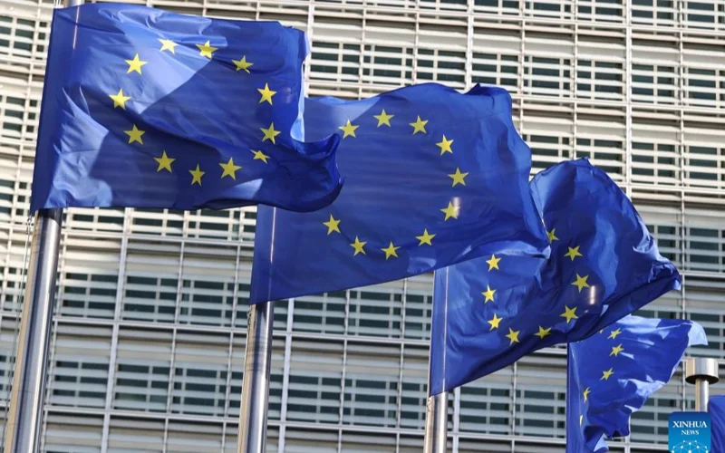  European Union flags at the European Commission headquarters in Brussels, Belgium. U.S. President Donald Trump on Friday threatened a 50 percent tax on all imports from the European Union as well a 25 percent tariff on Apple products unless iPhones are made in the United States