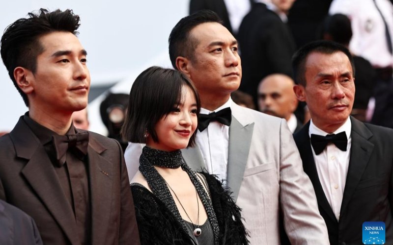 Cannes Cast members of the Chinese film Resurrection pose upon their arrival at the red carpet of the closing ceremony of the 78th Cannes Film Festival in Cannes, France, May 24, 2025.
