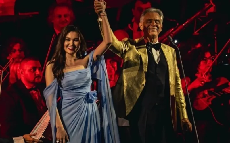 Aigerim Altynbek performs on stage with Andrea Bocelli