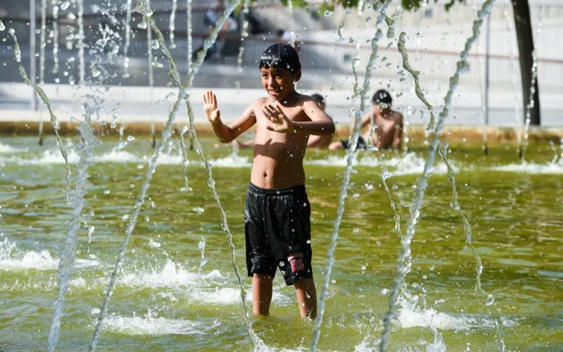 A boy cools off at a fountain in a park in Madrid, Spain, June 29, 2025. Spain has been hit by a new round of heatwave since Saturday, with temperatures in many regions expected to exceed 40 degrees Celsius in the coming days. 