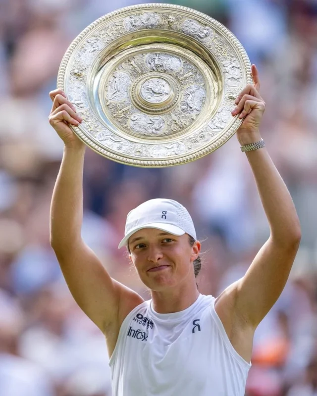 Świątek claims first Wimbledon title