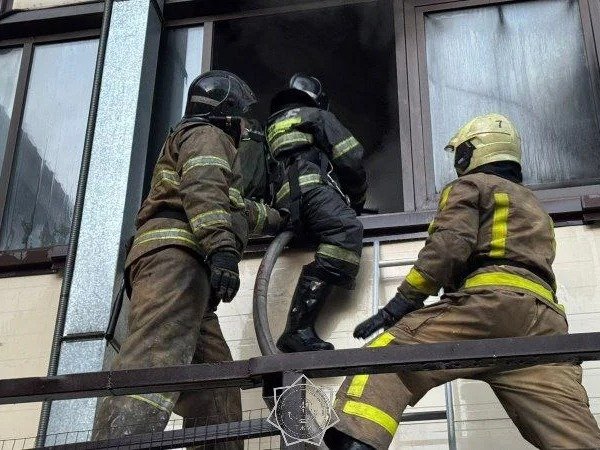 fire Firefighters battle large fire at market building in Astana