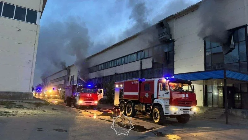 Firefighters battle large fire at market building in Astana