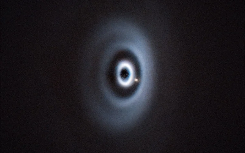 Astronomers photograph growing planet for first time