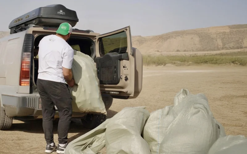 Jetour Ecocrew очистил берег реки Или: более 50 мешков отправлены на сортировку