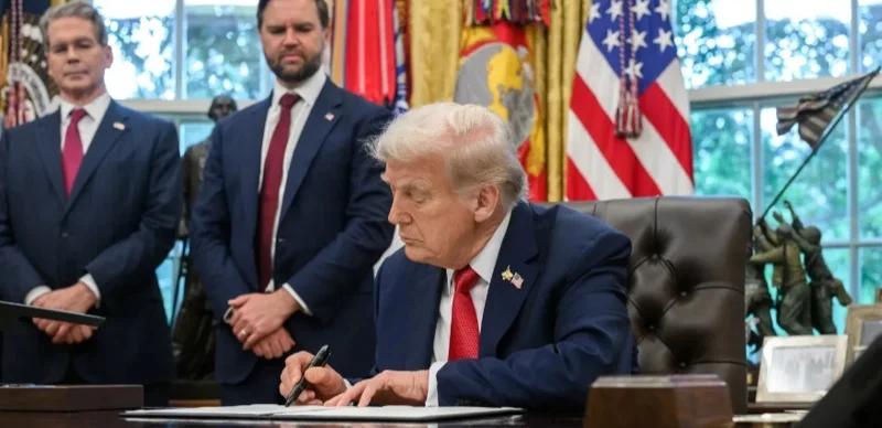 President Donald Trump signs proclamations and executive orders