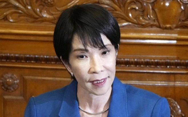 Japan PM vows to properly manage systems to accept foreign workers