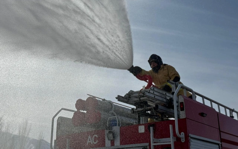 Firefighters extinguishing the blaze