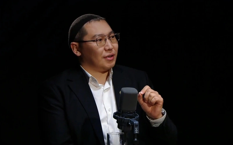 political analyst and international expert Rizzat Tasym