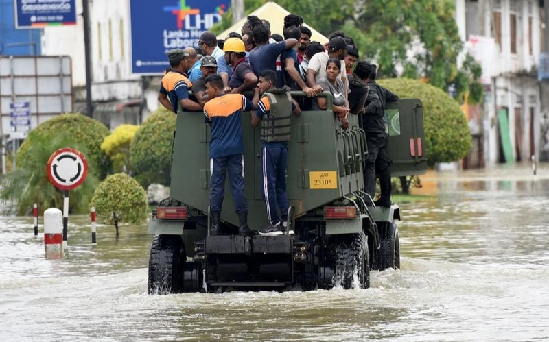Flood-affected people are transported to safe areas in Gampaha District, Sri Lanka, Nov. 29, 2025. 