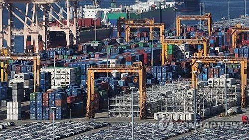 Containers are stacked at a port in Pyeongtaek, about 60 kilometers south of Seoul, on Nov. 14, 2025.