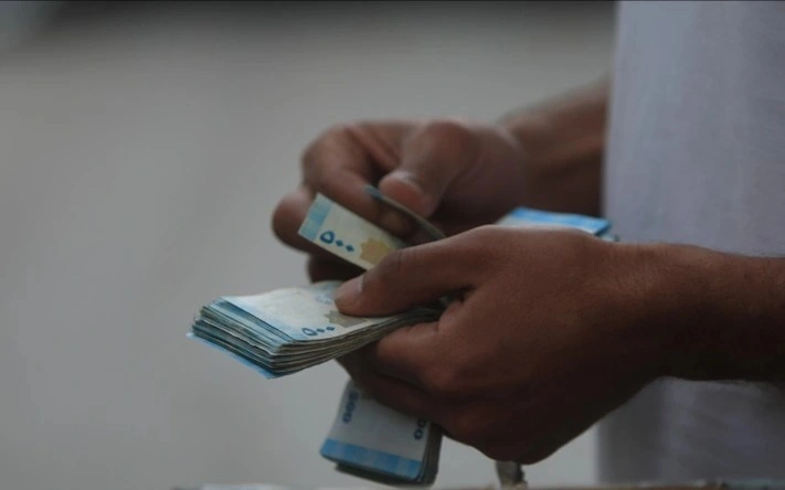 Syria introduces measures to stabilize market as new currency launched